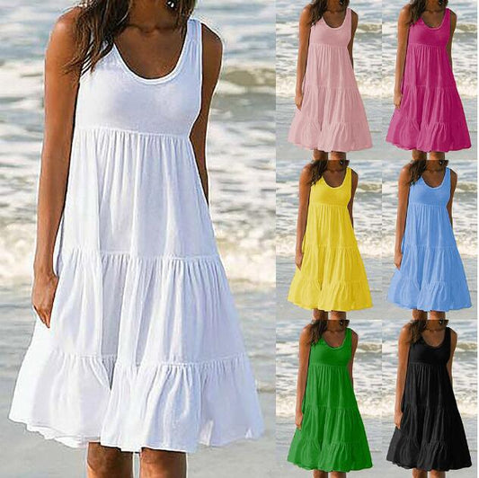 Ärmlös strand midi -klänning med paneler i en färg